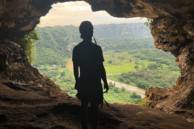 Cueva Ventana and Waterfall Adventure - Inside the limestone: cave lamps, helmets, and Taíno petroglyphs