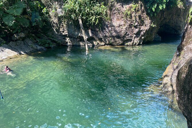 Private Full-Day Secret Hiking Tour to El Yunque Waterfalls - Las Tinajas paddling: swimming holes and waterfall scenery