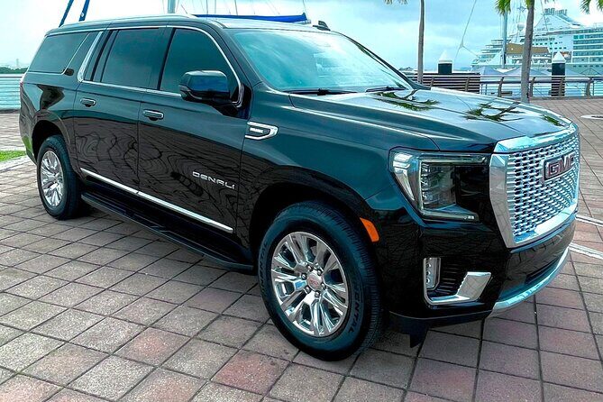 Puerto Rico Island Wide Private Transfers, Yukon Denali SUV - Your Chauffeur: Bilingual Help and Local Road Sense