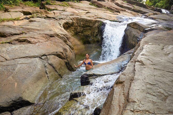 Yunque Rainforest River Rope Swing with Waterslide and Beach Tour - Luquillo’s volcanic rock world: rope swing, waterfall slide, and jump spots